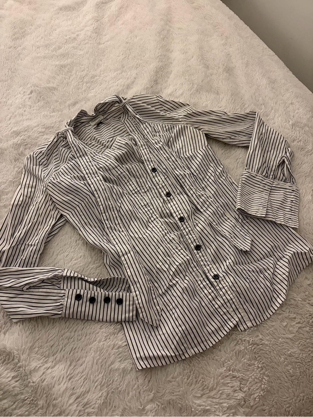 Woman’s Black and White Striped Button-Up Shirt